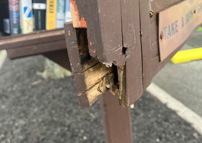 Photo of damaged Little Free Library
